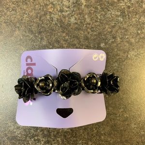 Claire’s black flower barrette